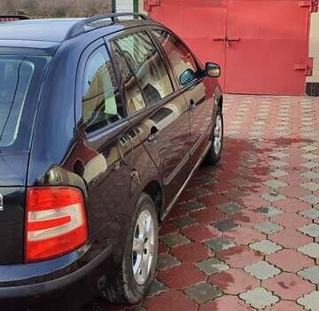 Черный Шкода Фабия, объемом двигателя 1.4 л и пробегом 387 тыс. км за 3500 $, фото 4 на Automoto.ua