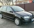 Черный Шкода Фабия, объемом двигателя 1.4 л и пробегом 225 тыс. км за 4800 $, фото 11 на Automoto.ua