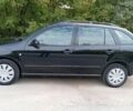 Черный Шкода Фабия, объемом двигателя 1.39 л и пробегом 214 тыс. км за 3200 $, фото 2 на Automoto.ua