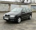 Черный Шкода Фабия, объемом двигателя 1.4 л и пробегом 233 тыс. км за 3800 $, фото 1 на Automoto.ua