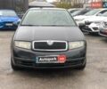 Черный Шкода Фабия, объемом двигателя 1.4 л и пробегом 308 тыс. км за 3390 $, фото 1 на Automoto.ua