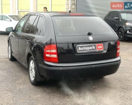 Черный Шкода Фабия, объемом двигателя 1.4 л и пробегом 308 тыс. км за 3390 $, фото 6 на Automoto.ua