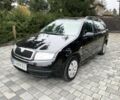 Черный Шкода Фабия, объемом двигателя 1.4 л и пробегом 230 тыс. км за 3999 $, фото 1 на Automoto.ua