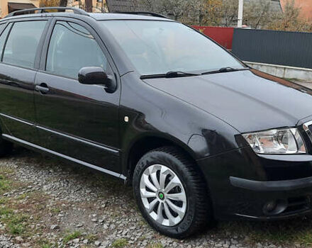 Черный Шкода Фабия, объемом двигателя 1.39 л и пробегом 168 тыс. км за 4600 $, фото 3 на Automoto.ua