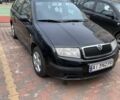 Черный Шкода Фабия, объемом двигателя 1.39 л и пробегом 230 тыс. км за 3300 $, фото 1 на Automoto.ua