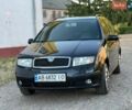 Черный Шкода Фабия, объемом двигателя 1.4 л и пробегом 235 тыс. км за 3500 $, фото 1 на Automoto.ua