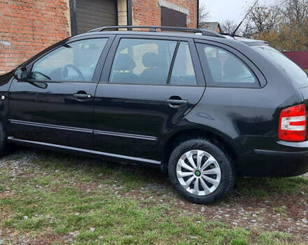 Черный Шкода Фабия, объемом двигателя 1.39 л и пробегом 168 тыс. км за 4600 $, фото 13 на Automoto.ua