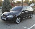 Черный Шкода Фабия, объемом двигателя 1.39 л и пробегом 216 тыс. км за 4799 $, фото 1 на Automoto.ua