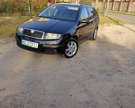 Черный Шкода Фабия, объемом двигателя 1.39 л и пробегом 237 тыс. км за 4100 $, фото 5 на Automoto.ua