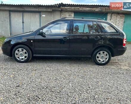 Шкода Фабия 2005 в Казатине на Automoto.ua Черный Шкода Фабия, объемом двигателя 1.4 л и пробегом 184 тыс. км за 4900 $, фото 3 на Automoto.ua