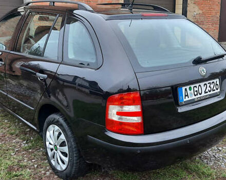 Черный Шкода Фабия, объемом двигателя 1.39 л и пробегом 168 тыс. км за 4600 $, фото 19 на Automoto.ua