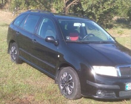 Черный Шкода Фабия, объемом двигателя 1.4 л и пробегом 208 тыс. км за 4000 $, фото 2 на Automoto.ua