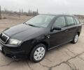 Чорний Шкода Фабія, об'ємом двигуна 1.2 л та пробігом 225 тис. км за 3450 $, фото 1 на Automoto.ua