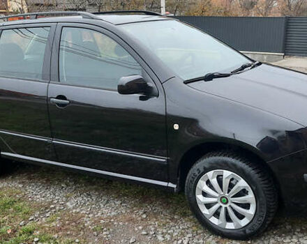 Черный Шкода Фабия, объемом двигателя 1.39 л и пробегом 168 тыс. км за 4600 $, фото 10 на Automoto.ua