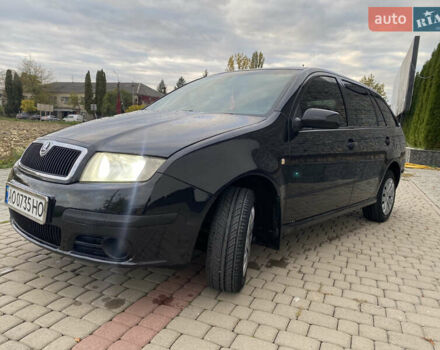 Черный Шкода Фабия, объемом двигателя 1.2 л и пробегом 205 тыс. км за 3200 $, фото 6 на Automoto.ua