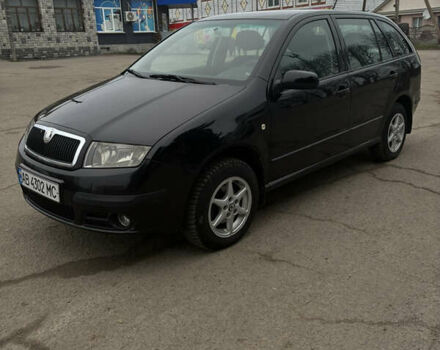 Черный Шкода Фабия, объемом двигателя 1.4 л и пробегом 293 тыс. км за 3950 $, фото 2 на Automoto.ua