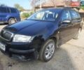 Черный Шкода Фабия, объемом двигателя 1.39 л и пробегом 208 тыс. км за 3800 $, фото 1 на Automoto.ua