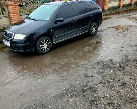 Черный Шкода Фабия, объемом двигателя 1.4 л и пробегом 247 тыс. км за 6000 $, фото 1 на Automoto.ua