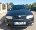 Черный Шкода Фабия, объемом двигателя 1.4 л и пробегом 312 тыс. км за 3550 $, фото 1 на Automoto.ua