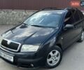 Черный Шкода Фабия, объемом двигателя 1.4 л и пробегом 227 тыс. км за 4750 $, фото 1 на Automoto.ua