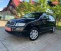 Черный Шкода Фабия, объемом двигателя 1.39 л и пробегом 213 тыс. км за 4150 $, фото 1 на Automoto.ua