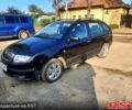 Черный Шкода Фабия, объемом двигателя 1.4 л и пробегом 208 тыс. км за 3400 $, фото 1 на Automoto.ua