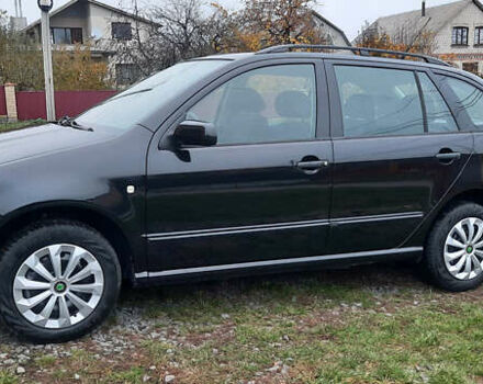 Черный Шкода Фабия, объемом двигателя 1.39 л и пробегом 168 тыс. км за 4600 $, фото 11 на Automoto.ua