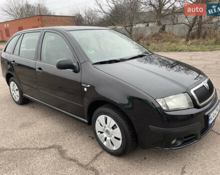 Черный Шкода Фабия, объемом двигателя 1.2 л и пробегом 245 тыс. км за 3450 $, фото 2 на Automoto.ua