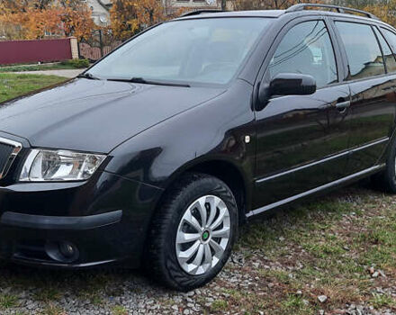 Черный Шкода Фабия, объемом двигателя 1.39 л и пробегом 168 тыс. км за 4600 $, фото 4 на Automoto.ua