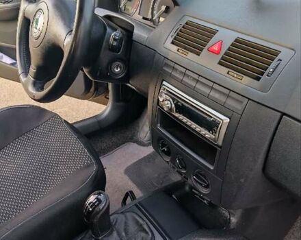 Черный Шкода Фабия, объемом двигателя 1.39 л и пробегом 240 тыс. км за 5000 $, фото 16 на Automoto.ua