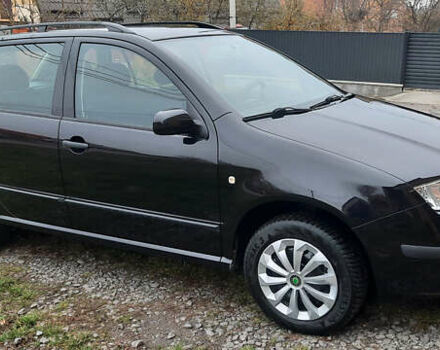 Черный Шкода Фабия, объемом двигателя 1.39 л и пробегом 168 тыс. км за 4600 $, фото 9 на Automoto.ua