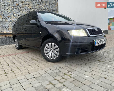 Черный Шкода Фабия, объемом двигателя 1.2 л и пробегом 205 тыс. км за 3200 $, фото 1 на Automoto.ua