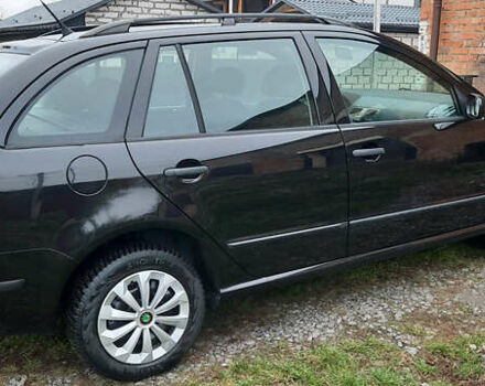 Черный Шкода Фабия, объемом двигателя 1.39 л и пробегом 168 тыс. км за 4600 $, фото 17 на Automoto.ua