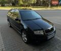 Черный Шкода Фабия, объемом двигателя 1.4 л и пробегом 169 тыс. км за 5200 $, фото 1 на Automoto.ua