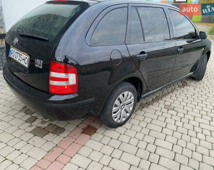 Черный Шкода Фабия, объемом двигателя 1.2 л и пробегом 205 тыс. км за 3200 $, фото 2 на Automoto.ua
