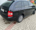 Черный Шкода Фабия, объемом двигателя 1.2 л и пробегом 205 тыс. км за 3200 $, фото 2 на Automoto.ua