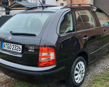Черный Шкода Фабия, объемом двигателя 1.39 л и пробегом 168 тыс. км за 4600 $, фото 18 на Automoto.ua
