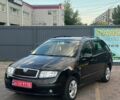 Черный Шкода Фабия, объемом двигателя 1.4 л и пробегом 160 тыс. км за 5700 $, фото 1 на Automoto.ua