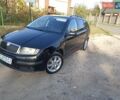 Черный Шкода Фабия, объемом двигателя 1.39 л и пробегом 237 тыс. км за 4100 $, фото 1 на Automoto.ua