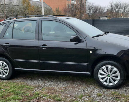 Черный Шкода Фабия, объемом двигателя 1.39 л и пробегом 168 тыс. км за 4600 $, фото 15 на Automoto.ua