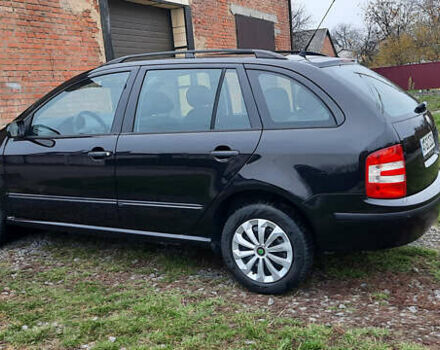 Черный Шкода Фабия, объемом двигателя 1.39 л и пробегом 168 тыс. км за 4600 $, фото 14 на Automoto.ua