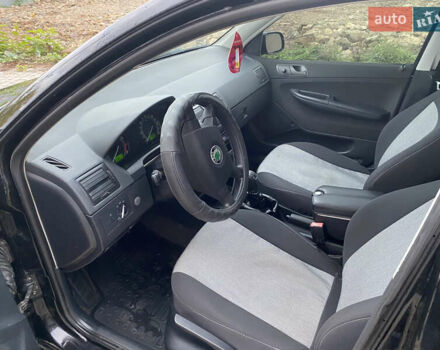Черный Шкода Фабия, объемом двигателя 1.2 л и пробегом 205 тыс. км за 3200 $, фото 11 на Automoto.ua