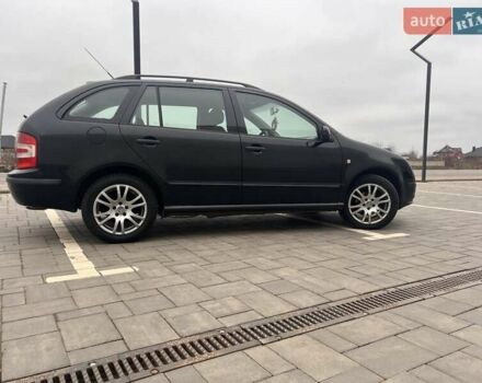 Черный Шкода Фабия, объемом двигателя 1.42 л и пробегом 262 тыс. км за 4200 $, фото 4 на Automoto.ua