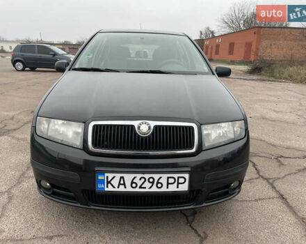 Черный Шкода Фабия, объемом двигателя 1.2 л и пробегом 245 тыс. км за 3450 $, фото 1 на Automoto.ua