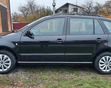 Черный Шкода Фабия, объемом двигателя 1.39 л и пробегом 168 тыс. км за 4600 $, фото 12 на Automoto.ua