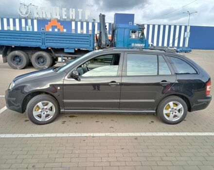 Черный Шкода Фабия, объемом двигателя 1.4 л и пробегом 179 тыс. км за 4950 $, фото 1 на Automoto.ua