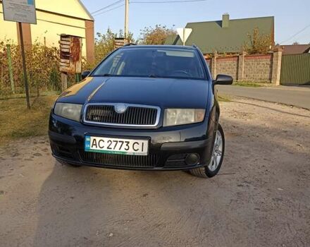 Черный Шкода Фабия, объемом двигателя 1.39 л и пробегом 237 тыс. км за 4100 $, фото 2 на Automoto.ua