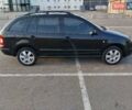 Черный Шкода Фабия, объемом двигателя 1.39 л и пробегом 240 тыс. км за 5000 $, фото 1 на Automoto.ua