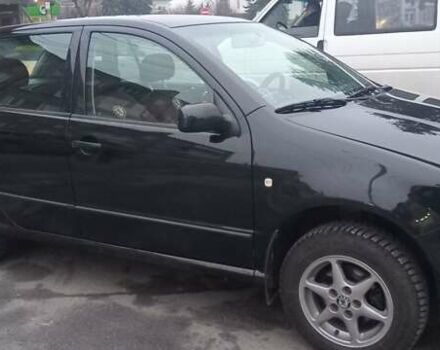 Черный Шкода Фабия, объемом двигателя 1.4 л и пробегом 293 тыс. км за 3850 $, фото 1 на Automoto.ua