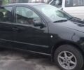 Черный Шкода Фабия, объемом двигателя 1.4 л и пробегом 293 тыс. км за 3850 $, фото 1 на Automoto.ua